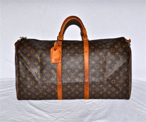 lv duffle bag 55|louis vuitton duffle bag suitcase.